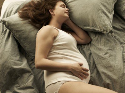 Gravidez: na cama com a barriga